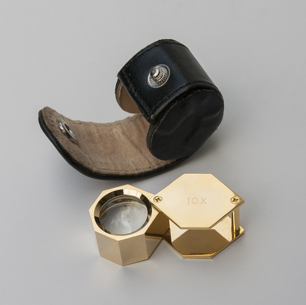 Taschenlupe, 10‑fach, 6‑eckig,&nbspvergoldet, 18mm, Leder‑Etui